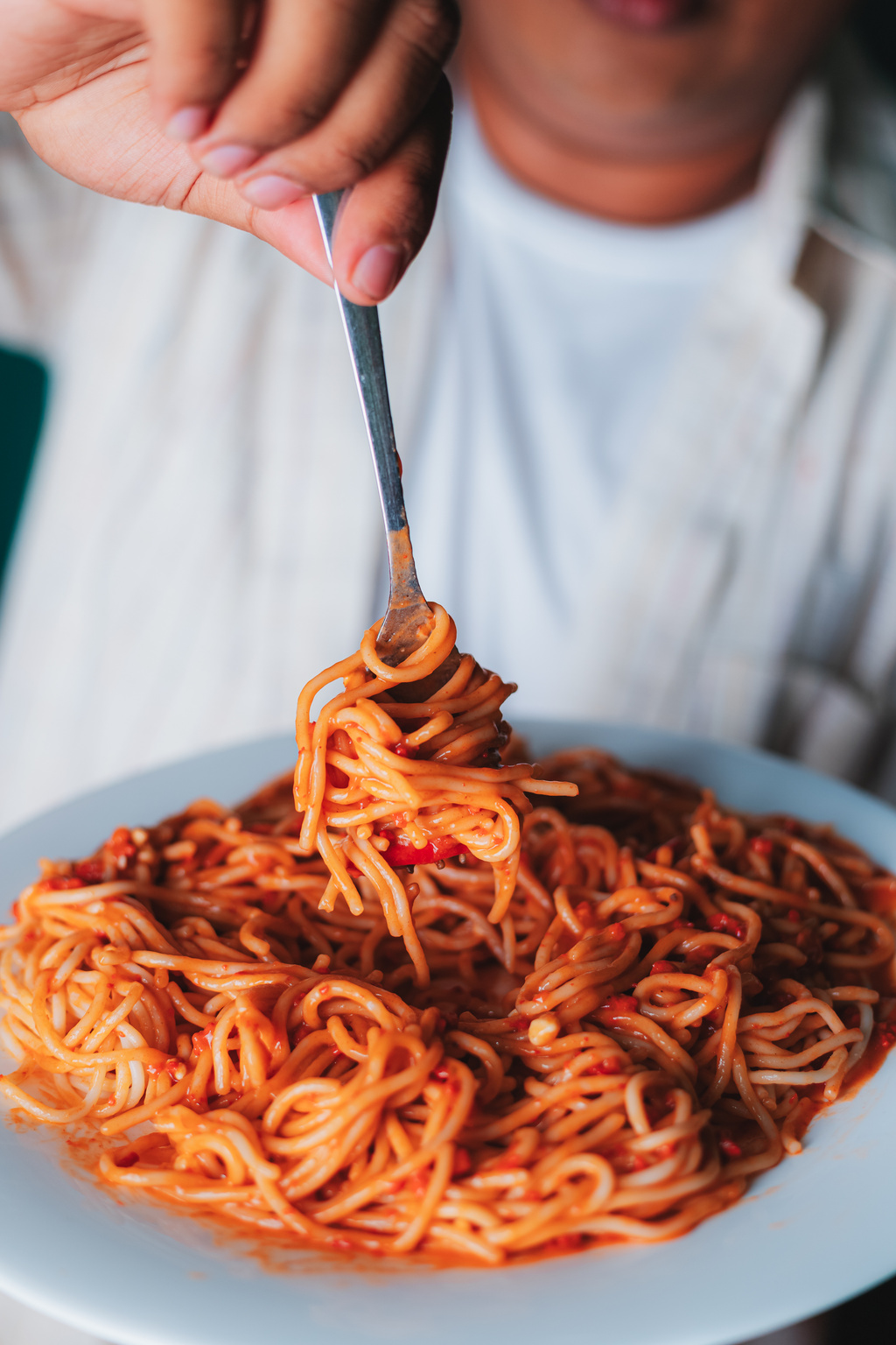 Person Eating Spaghetti