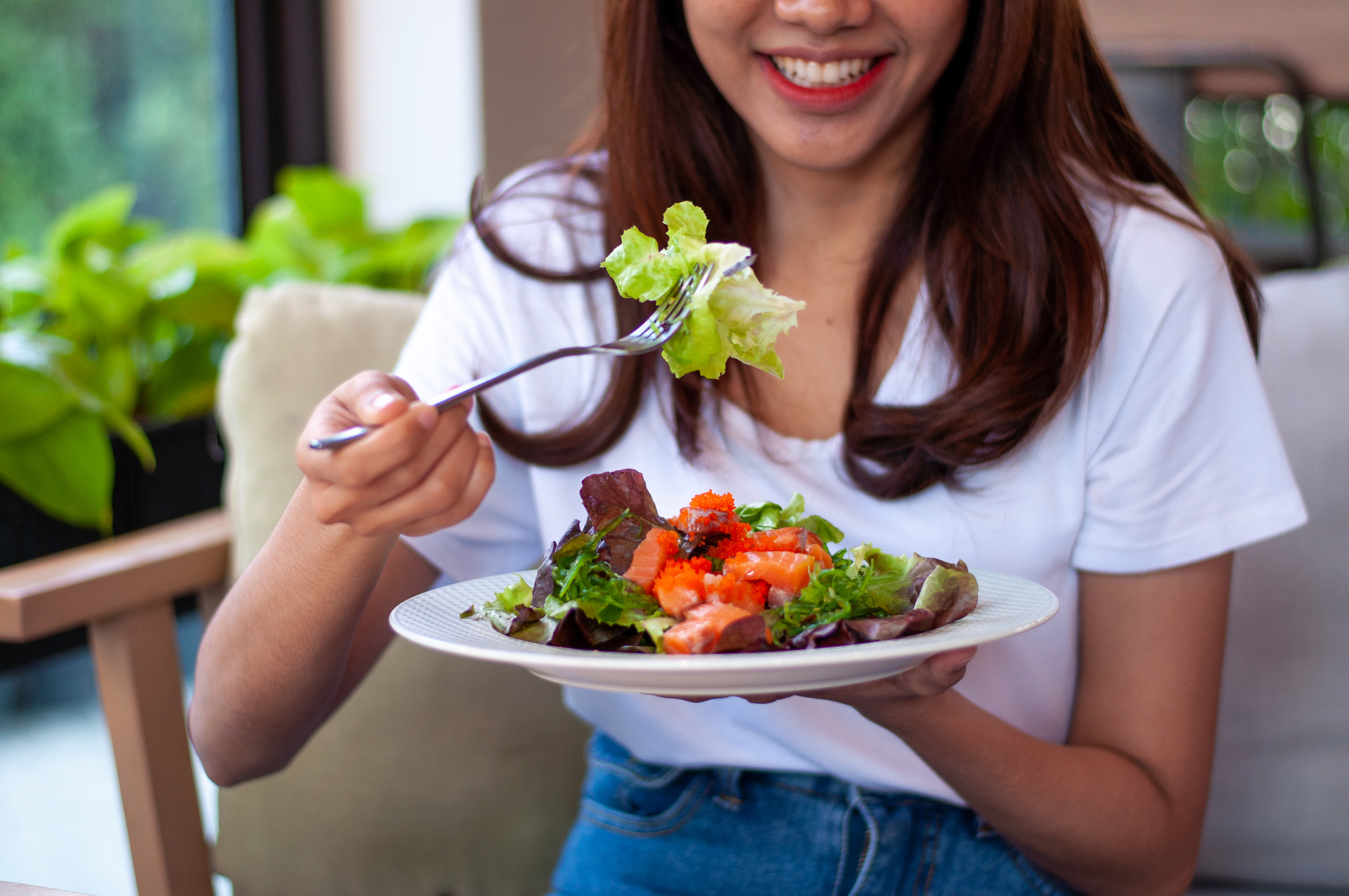 Woman Eating Salad 
