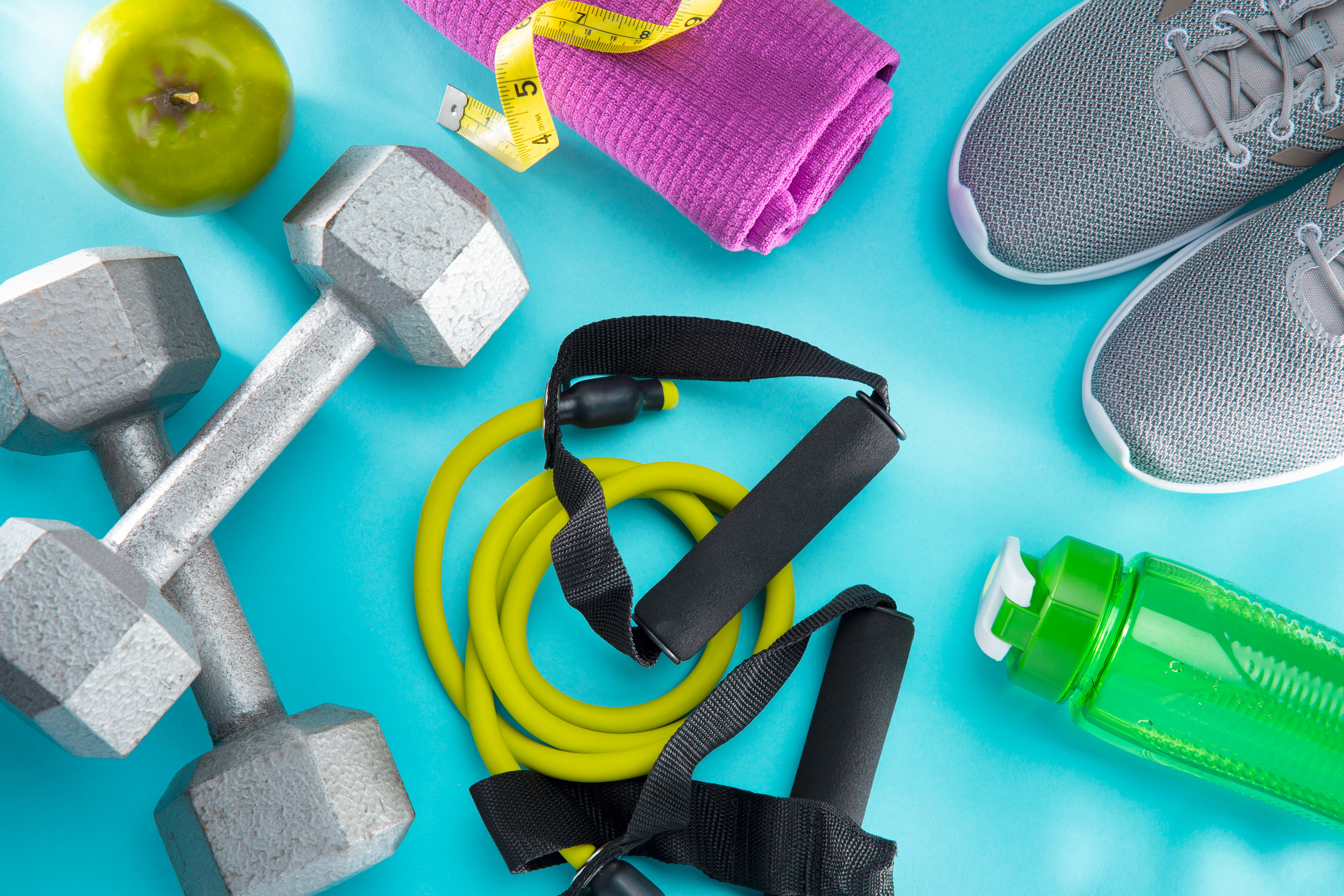 Exercise equipment on a blue background